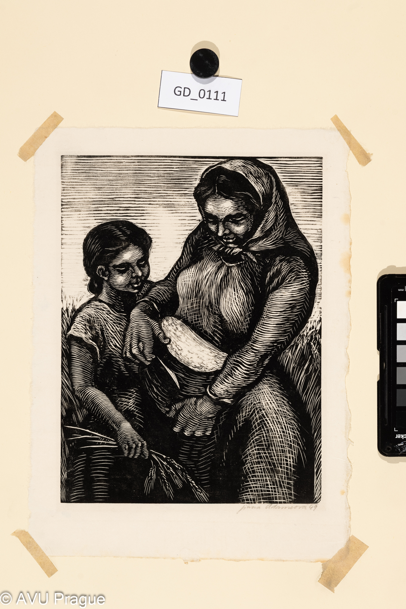 Jiřina Adamcová; Krájení chleba;1949; Dřevoryt;23,9 x 17,9;29,5 x 22;Silovský